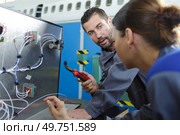 portrait of workers with cables. Стоковое фото, агентство Ingram Publishing / Фотобанк Лори
