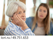 strong quarrel between elderly mother and her adult daughter. Стоковое фото, агентство Ingram Publishing / Фотобанк Лори