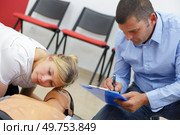 hand heart pump with medical dummy on cpr. Стоковое фото, агентство Ingram Publishing / Фотобанк Лори