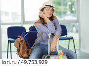 woman on the phone waiting at the airport. Стоковое фото, агентство Ingram Publishing / Фотобанк Лори