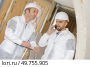 portrait of contractor cost estimating. Стоковое фото, агентство Ingram Publishing / Фотобанк Лори