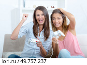 they are winning the virtual game. Стоковое фото, агентство Ingram Publishing / Фотобанк Лори