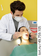 portrait of a reliable and cheerful female dentist. Стоковое фото, агентство Ingram Publishing / Фотобанк Лори