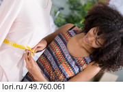 woman working on tailors dummy. Стоковое фото, агентство Ingram Publishing / Фотобанк Лори