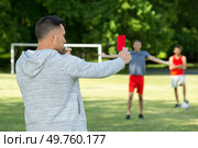 human hand with whistle red card. Стоковое фото, агентство Ingram Publishing / Фотобанк Лори