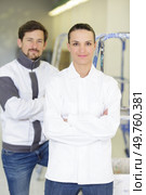 portrait of male and female decorators. Стоковое фото, агентство Ingram Publishing / Фотобанк Лори
