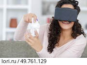 happy woman with virtual reality headset and joystick. Стоковое фото, агентство Ingram Publishing / Фотобанк Лори