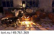 Spooky Halloween scene with skulls, pumpkins, and candles. 3D. Spooky Halloween scene with skulls, pumpkins, Стоковое фото, агентство Ingram Publishing / Фотобанк Лори
