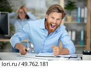 portrait of a screaming businessman. Стоковое фото, агентство Ingram Publishing / Фотобанк Лори