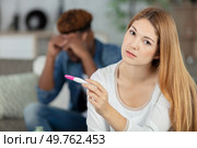 man husband upset about pregnancy test results. Стоковое фото, агентство Ingram Publishing / Фотобанк Лори