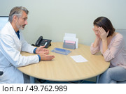 a doctor telling the bad news. Стоковое фото, агентство Ingram Publishing / Фотобанк Лори