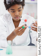 a young woman lab assistant in a genetics lab. Стоковое фото, агентство Ingram Publishing / Фотобанк Лори