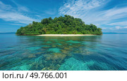 A tiny landmass sits in the center of the expansive ocean, surrounded by endless water.. Small Island Amidst Vast Ocean. Стоковое фото, агентство Ingram Publishing / Фотобанк Лори