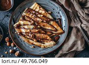 A plate filled with fluffy pancakes drizzled with rich chocolate sauce, ready to be enjoyed.. Plate of Pancakes With Chocolate Drizzle. Стоковое фото, агентство Ingram Publishing / Фотобанк Лори