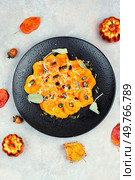Pumpkin filled ravioli with pumpkin seeds. Delicious vegetarian, seasonal food.. Ravioli stuffed with pumpkin. Стоковое фото, агентство Ingram Publishing / Фотобанк Лори