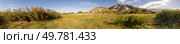 This stunning panoramic view showcases vibrant greenery and rolling hills under a clear blue sky, inviting everyone to embark on an unforgettable adventure through natures beauty. A breathtaking panoramic view of a stunning landscape with rolling hills and vibrant greenery. Стоковое фото, агентство Ingram Publishing / Фотобанк Лори