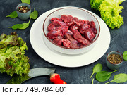 Raw deer meat for venison ragout or goulash.. Raw deer meat, raw meat. Стоковое фото, агентство Ingram Publishing / Фотобанк Лори