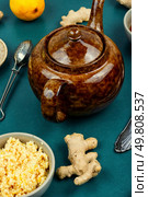 Hot lemon-ginger infusion or tea with honey. Hot healthy autumn drink.. Herbal tea with spices and ginger. Стоковое фото, агентство Ingram Publishing / Фотобанк Лори