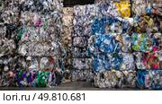 A landfill with piles of returns from e-commerce sites. Symbol of a major environmental problem caused by urban overconsumption waste. Abstract image. Стоковое AI-изображение, AI-художник ALLA YURTAYEVA / Фотобанк Лори