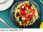 salad of pickled soybean sprouts, dried tomatoes, olives and peppers. Chinese food.. Vegan Salad of Pickled Vegetables and Soybeans. Стоковое фото, агентство Ingram Publishing / Фотобанк Лори