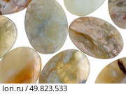 Jade malZ necklace and bracelet beads background isolated on white background. Стоковое фото, агентство Ingram Publishing / Фотобанк Лори