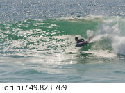 Body boarder riding a big wave. Стоковое фото, агентство Ingram Publishing / Фотобанк Лори