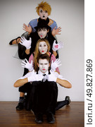 four mime actors in action. Стоковое фото, агентство Ingram Publishing / Фотобанк Лори