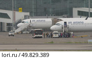 Air Astana plane, passengers boarding. Редакционное видео, видеограф Игорь Жоров / Фотобанк Лори