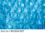 Blue Plastic bubble wrap pattern closeup. Стоковое фото, агентство Ingram Publishing / Фотобанк Лори