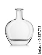 Empty bottle of cognac isolated on a white background. Clipping path. Стоковое фото, агентство Ingram Publishing / Фотобанк Лори