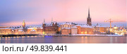 Panorama Cityscape of Gamla Stan Old Town Stockholm city at dusk Sweden. Стоковое фото, агентство Ingram Publishing / Фотобанк Лори