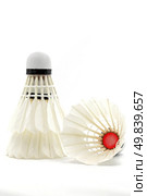 Badminton Shuttlecock Sport Equipment on White Background using as World Competition Concept. Стоковое фото, агентство Ingram Publishing / Фотобанк Лори