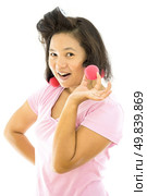 pretty young adult woman with hair curlers on white background. Стоковое фото, агентство Ingram Publishing / Фотобанк Лори