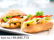 baguette sandwich with pork and vegetable. Стоковое фото, агентство Ingram Publishing / Фотобанк Лори