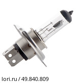 A halogen car headlamp bulb with main and dipped beams. Стоковое фото, агентство Ingram Publishing / Фотобанк Лори