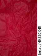 Crumpled red paper with texture background. Стоковое фото, агентство Ingram Publishing / Фотобанк Лори