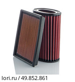 Air filters on white background. Vehicle Modification Accessories. Стоковое фото, агентство Ingram Publishing / Фотобанк Лори
