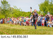 Russia, Samara, June 2016: A dashing Cossack on horseback during a demonstration performance at the Journey to the Past festival. Редакционное фото, фотограф Акиньшин Владимир / Фотобанк Лори