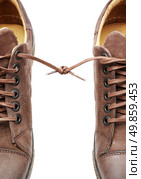 Pair of shoes bound together. Element of design. Стоковое фото, агентство Ingram Publishing / Фотобанк Лори