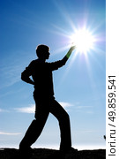 Silhouette of persons from the side and sun. Element of design. Стоковое фото, агентство Ingram Publishing / Фотобанк Лори