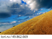 Mountain declivity and cloudy sky. Nature composition. Стоковое фото, агентство Ingram Publishing / Фотобанк Лори