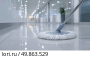 Floor Mop Gliding on Glossy Dental Clinic Tiles, Reflective Wet Surface Deep Cleaning. Стоковое AI-изображение, AI-художник Katsiaryna Repich / Фотобанк Лори