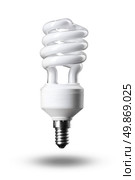 Energy saving fluorescent light bulb isolated on white. Стоковое фото, агентство Ingram Publishing / Фотобанк Лори