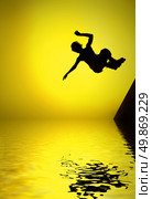 silhouette of roller boy jumping in air. Стоковое фото, агентство Ingram Publishing / Фотобанк Лори