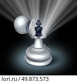 Power within and Leadership potential as an emerging business as a chess game king figurine revealed inside a large pawn disguise as a concept for strategy of success with a star burst shinning light on black. Стоковое фото, агентство Ingram Publishing / Фотобанк Лори