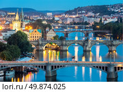 view of Bridges on Vltava, Prague at dusk. Стоковое фото, агентство Ingram Publishing / Фотобанк Лори