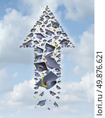Education success as a group of graduation hats thrown up to the sky shaped as an upward arrow as a career launch with a traditional hat toss for the graduate university and college students as a concept of opportunity. Стоковое фото, агентство Ingram Publishing / Фотобанк Лори