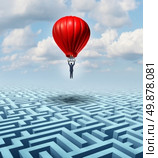 Rise above adversity solution Leadership with a businessman flying and soaring over a complicated maze with the help of a hot air balloon as a business concept of innovative creative thinking for financial success. Стоковое фото, агентство Ingram Publishing / Фотобанк Лори