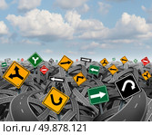 Direction uncertainty with a landscape of confused tangled roads and highways and a group of traffic signs competing for influence as a symbol of the challenges of planning a strategy for success. . Стоковое фото, агентство Ingram Publishing / Фотобанк Лори