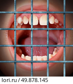 Censorship and free speech concept with a shouting or yelling human mouth behind prison bars as a symbol of a communication ban or banned from communication due to restrictions in the media guidlines and internet police. Стоковое фото, агентство Ingram Publishing / Фотобанк Лори